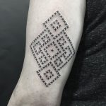 Geometric pattern tattoo made of letter x
