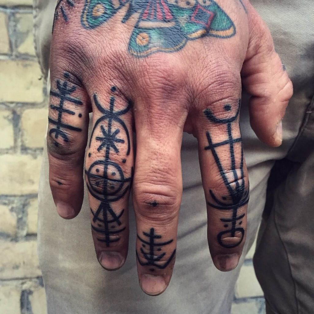 Geometric shapes finger tattoos