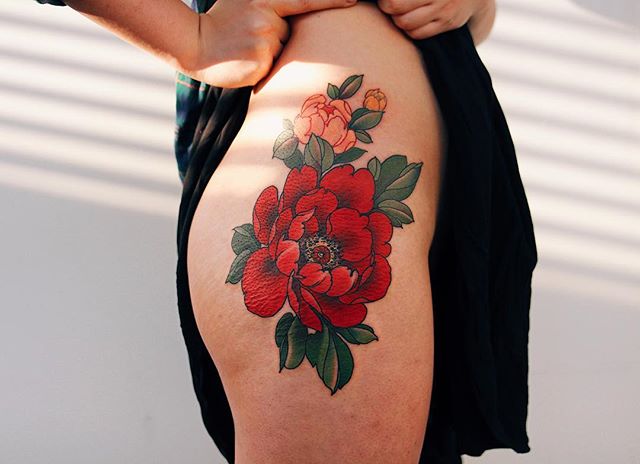 Gorgeous realistic flower tattoo