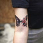 Half realistic half floral butterfly tattoo