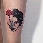 Half rose face tattoo