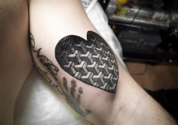 Heart shaped geometric pattern tattoo