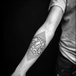 Joy division inspired arm tattoo