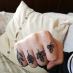 Leaves tattoos on the fingers