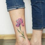 Lily tattoo on the leg