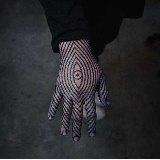 Linear geometric hand tattoo