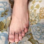 Loser tattoo on the foot