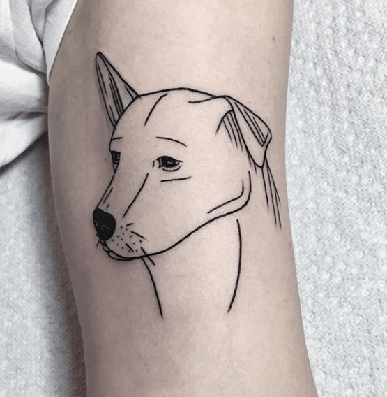 Lovely outline dog tattoo