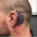 Mandala tattoo behind the ear