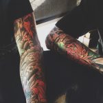 Matching japanese style full sleeve tattoos