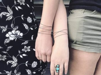 Matching bracelet tattoos
