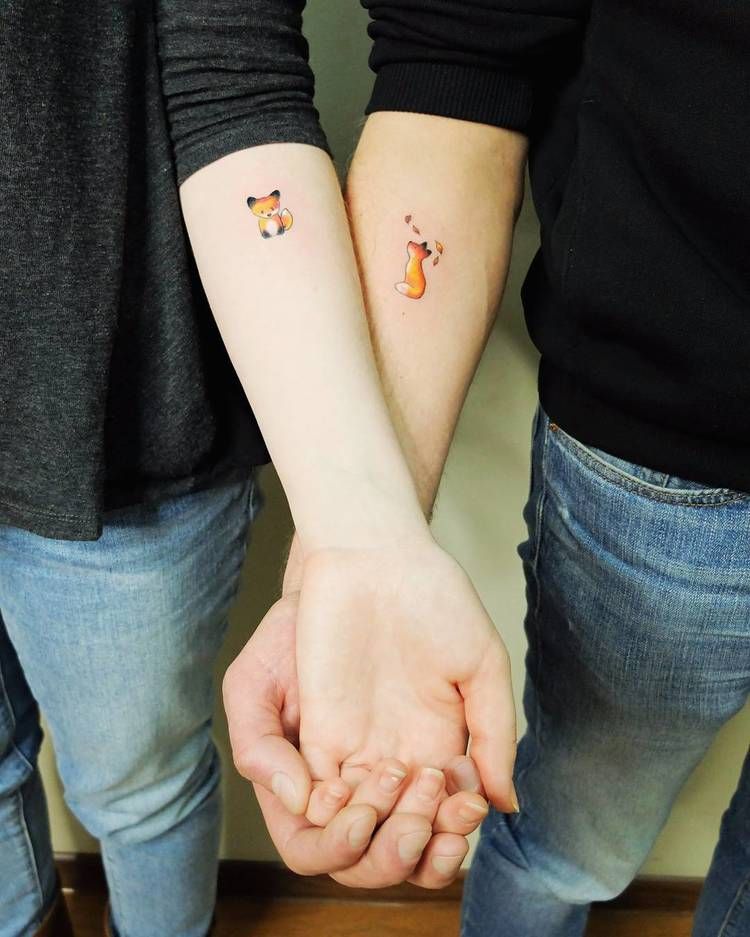 Matching fox tattoos