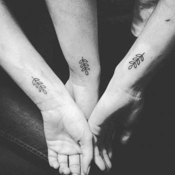 Matching leaves tattoos