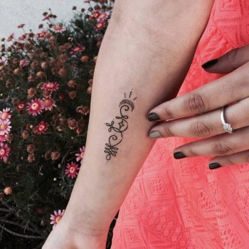 Minimal abstract symbol tattoo