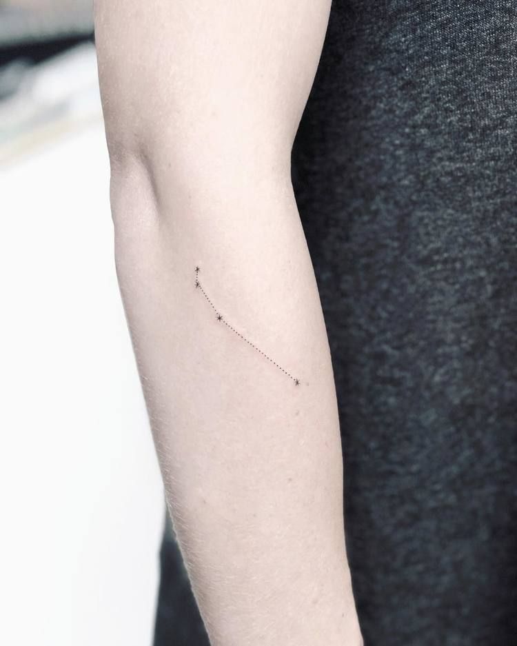 Minimalist aries constellation tattoo on the arm