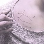 Minimalist gemini constellation tattoo