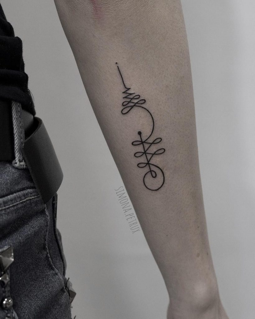 Unalome tattoo on the left arm 