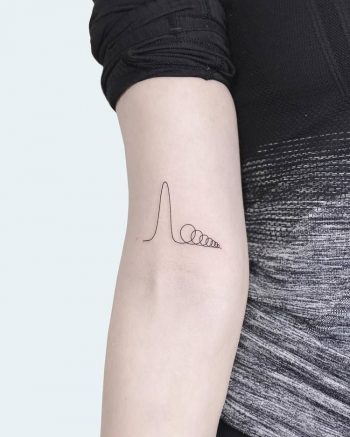 Minimalist thin spiral tattoo