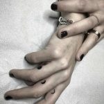 Moon phases tattoos on fingers