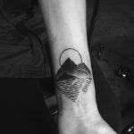 Mountain with a reflection tattoo