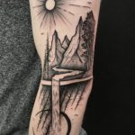 Mountains and a river tattoo
