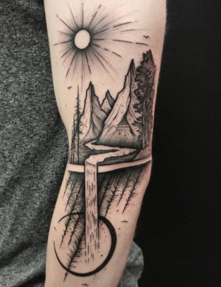 Mountains and a river tattoo