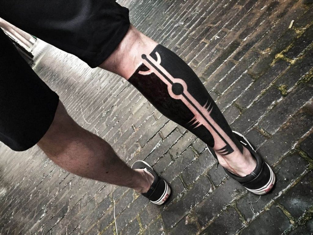 Negative space full calf tattoo
