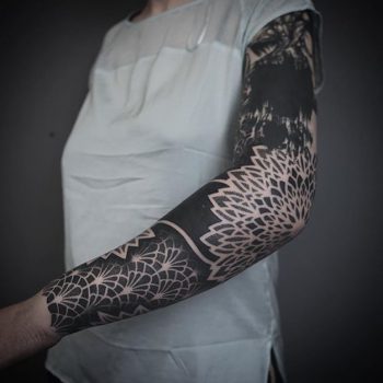 Negative space full sleeve mandala tattoo