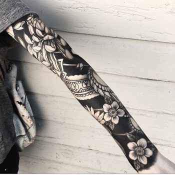 Negative space full sleeve tattoo