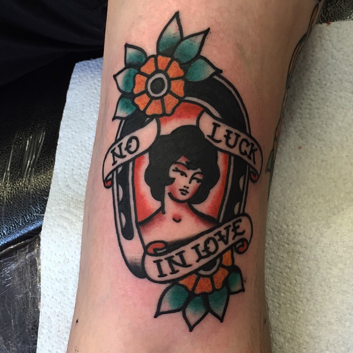 No luck in love tattoo