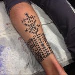 Nordic pattern tattoo on the calf