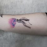 Painting watercolor tattoo