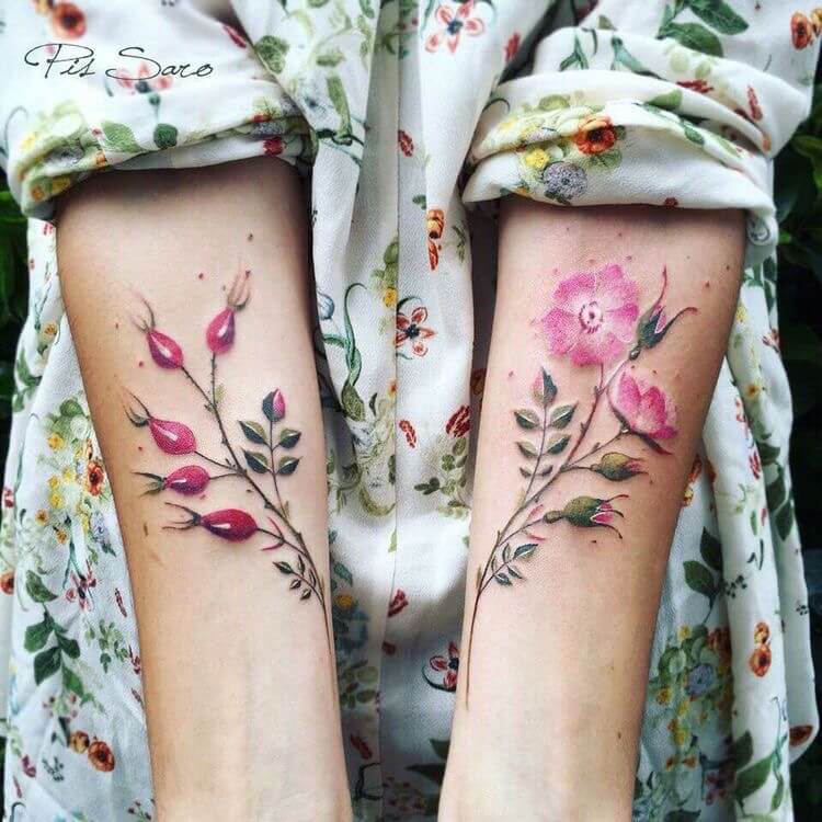 Pink delicate flower tattoos