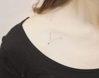 Pisces constellation tattoo on the collarbone