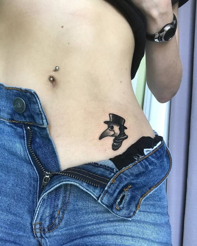 Plague doctor tattoo on the hip