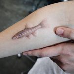 Realistic dotwork fish tattoo