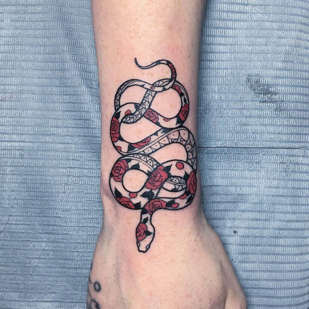 Red and black snake tattoo on right arm