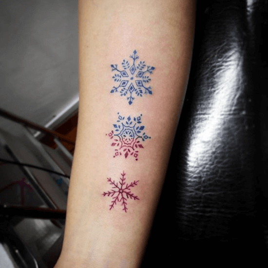 Red and blue frozen snowflakes tattoo