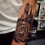 Sailor theme tattoo on the arm