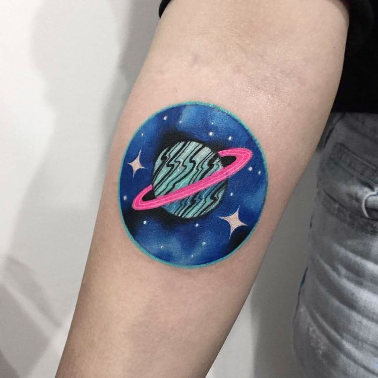 Saturn tattoo in a circle