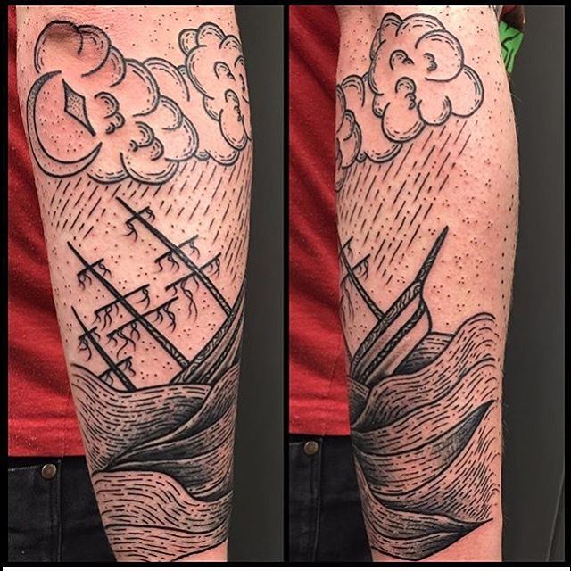 Ship in a sea scenery tattoo