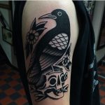 Skull and raven tattoo