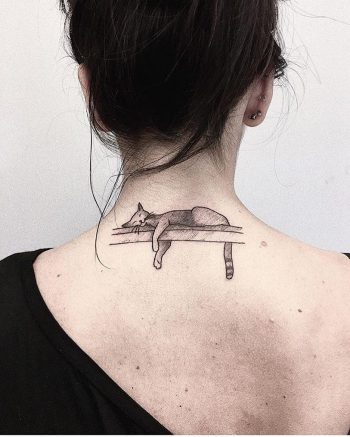 Sleeping cat tattoo