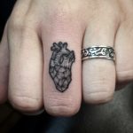 Small antatomical heart tattoo
