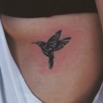Small black colibri tattoo