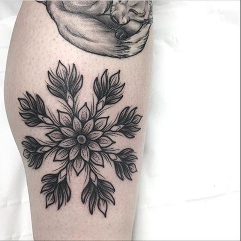 Snowflake mandala tattoo