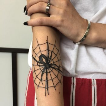 Spider in the web tattoo