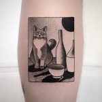Still life tattoo with a cat