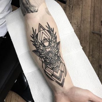 Stylized deer head tattoo