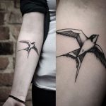 Swallow tattoo on the inner arm